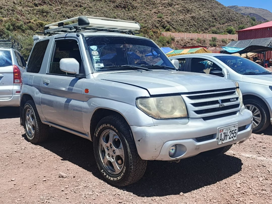 MITSUBISHI PAJERO IO 2000 — foto 1