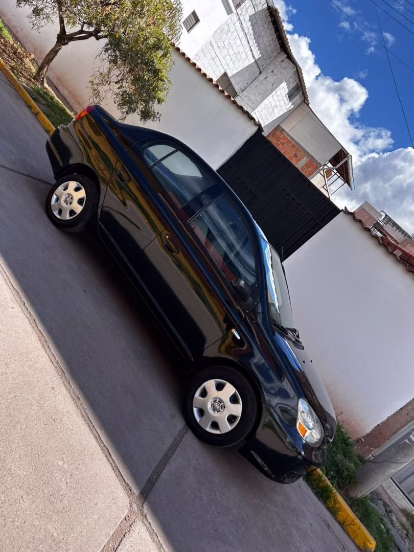 TOYOTA YARIS 2004 — foto 3